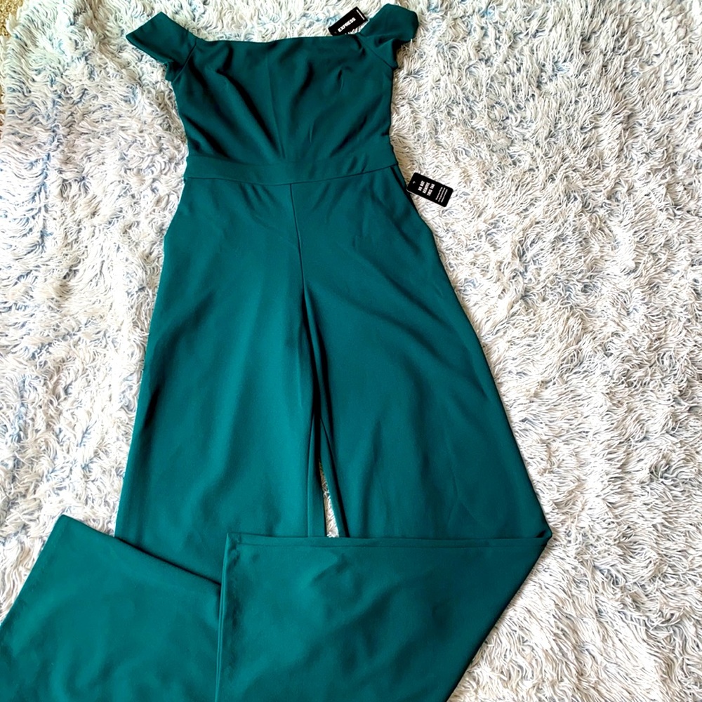 Green bell bottom jumpsuit.